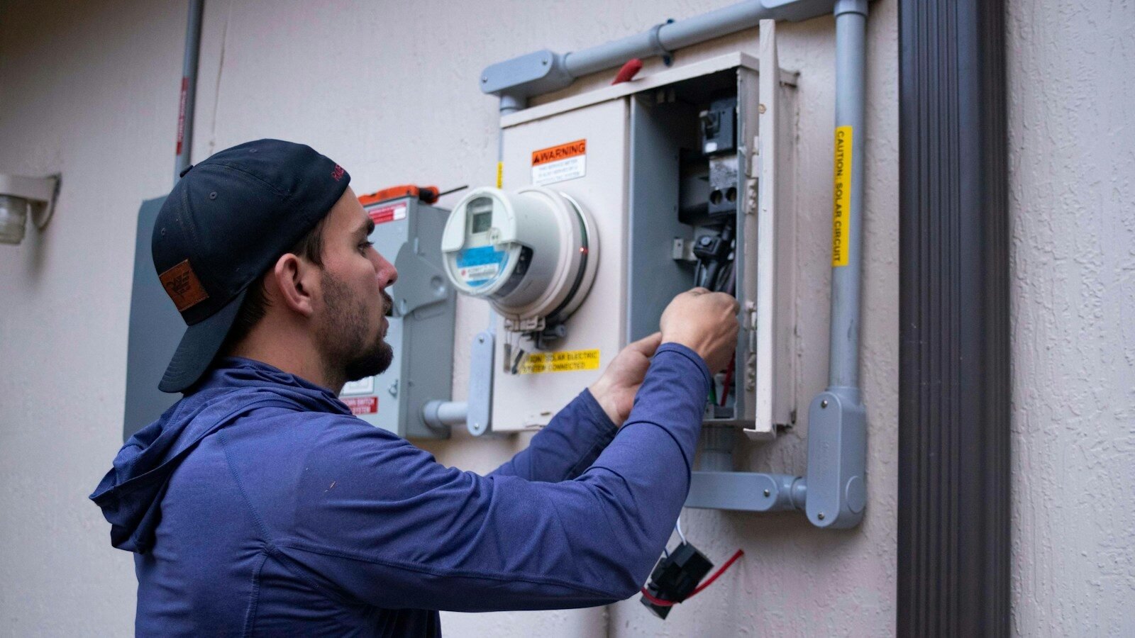 Air conditioner technician at work in Perth