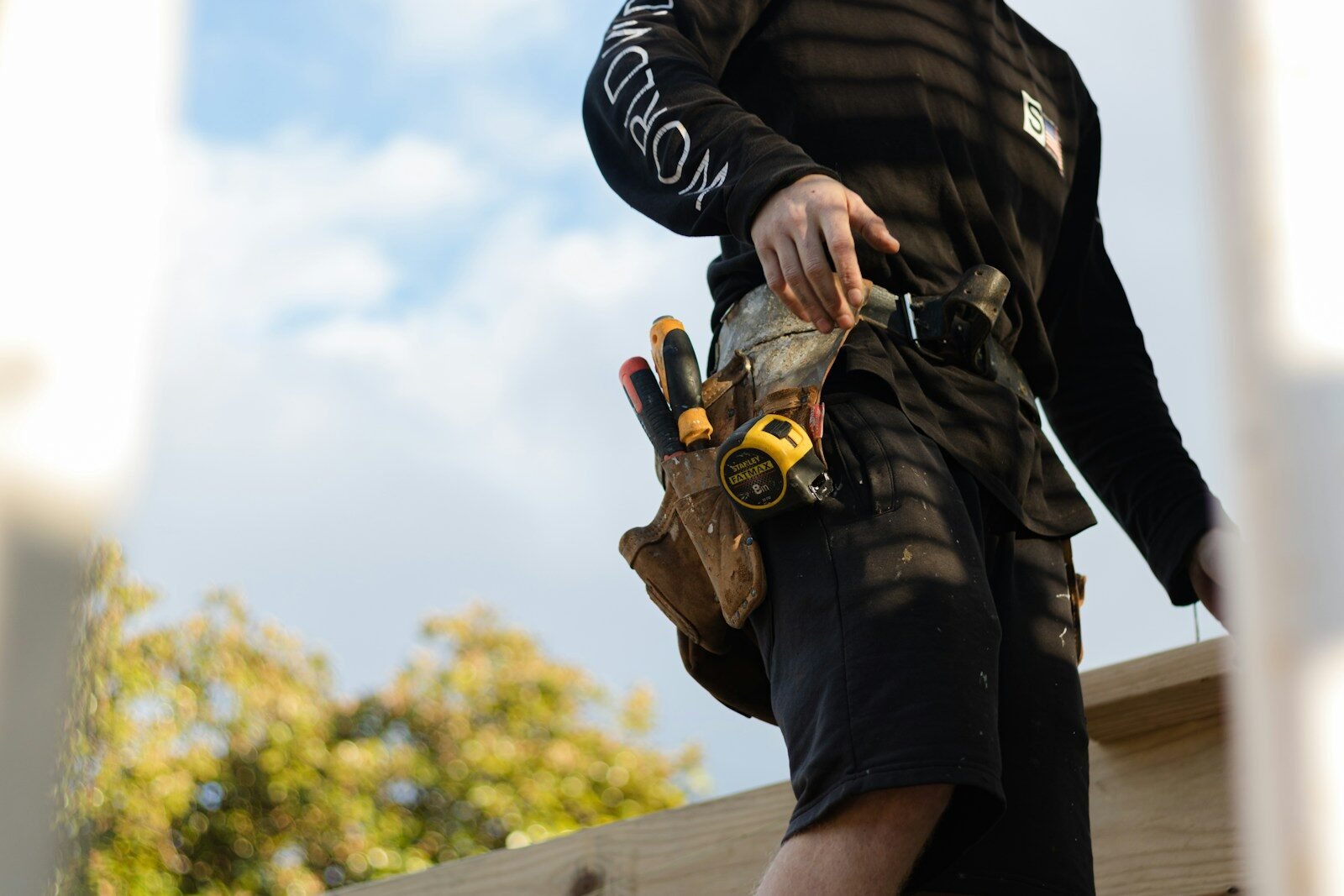 Carpenter with tool belt in Canberra