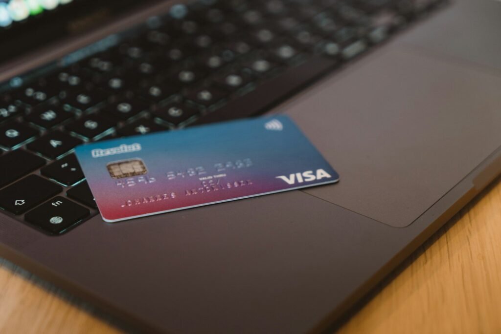 Shopify SEO services for ecommerce stores – debit card on dark laptop keyboard representing secure online checkout and Shopify store optimisation